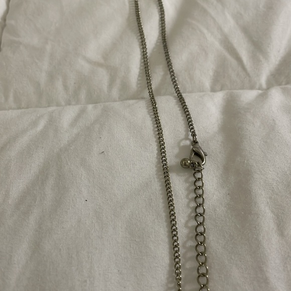 Sterling silver necklace with one charm added to this 16” necklace. - Picture 3 of 5